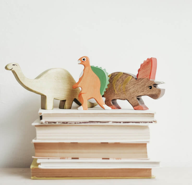 Hand-carved dinosaur toys for kids