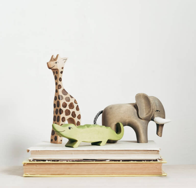 Hand-carved safari animal toys